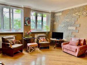 TV a/nebo společenská místnost v ubytování Eco Holiday House