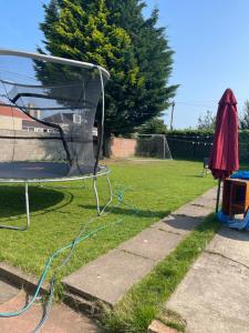 a soccer field with a net in the grass at One Bedroom Self Catered Serviced Accommodation 10 Minutes from City Center in Edinburgh