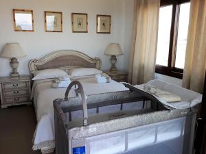 A bed or beds in a room at Seaview Villa
