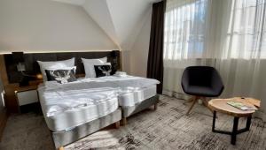 Postel nebo postele na pokoji v ubytování Willa Spa Scaliano