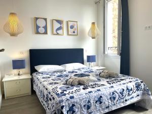 Posteľ alebo postele v izbe v ubytovaní SUNRISE BALCONY