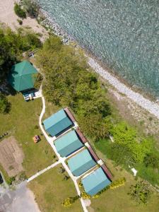 an aerial view of a house with blue roofs at Tara Riverside in Mojkovac
