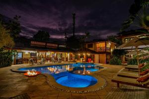 A piscina localizada em Paraíso Ecológico Pousada & SPA ou nos arredores