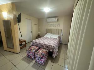 Postel nebo postele na pokoji v ubytování Apartamento Em Andar Alto com Vista Mar Meireles
