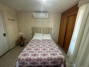 Postel nebo postele na pokoji v ubytování Apartamento Em Andar Alto com Vista Mar Meireles