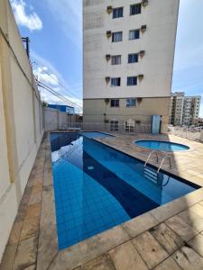 a swimming pool on the roof of a building at 605 SEVILHA in Serra