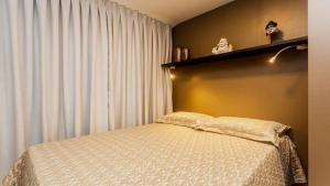 Кровать или кровати в номере I HOME FLAT TEMPORADA +103 фотографии