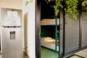 Postel nebo postele na pokoji v ubytování Casa Nomada Tuxtla Hotel - Hostal