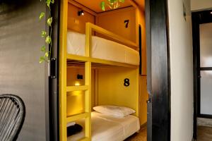 Postel nebo postele na pokoji v ubytování Casa Nomada Tuxtla Hotel - Hostal