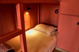 Postel nebo postele na pokoji v ubytování Casa Nomada Tuxtla Hotel - Hostal