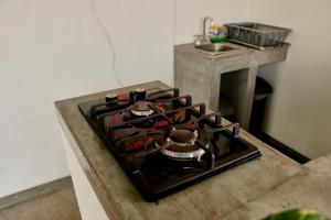 Kuchyň nebo kuchyňský kout v ubytování Casa Nomada Tuxtla Hotel - Hostal