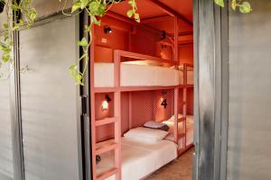 Postel nebo postele na pokoji v ubytování Casa Nomada Tuxtla Hotel - Hostal