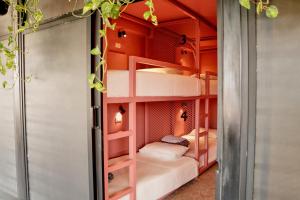 Postel nebo postele na pokoji v ubytování Casa Nomada Tuxtla Hotel - Hostal
