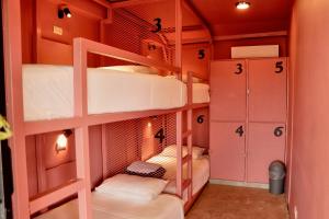 Postel nebo postele na pokoji v ubytování Casa Nomada Tuxtla Hotel - Hostal