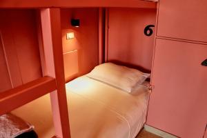 Postel nebo postele na pokoji v ubytování Casa Nomada Tuxtla Hotel - Hostal