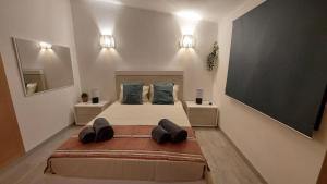 Postel nebo postele na pokoji v ubytování Casa Azinheira - Albufeira