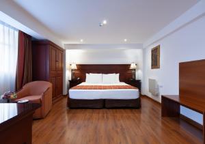 Letto o letti in una camera di Terra Andina Colonial Mansion