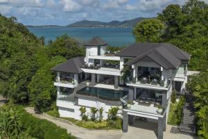 an aerial view of a house with a swimming pool at Luxury Villa in Cape Panwa in Panwa Beach