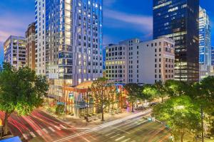 a city with tall buildings and a street with cars at Element Austin Downtown in Austin