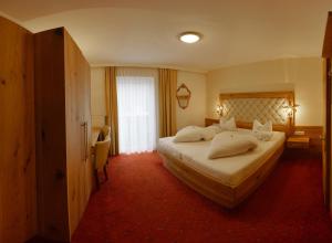 Posteľ alebo postele v izbe v ubytovaní Hotel Habicht