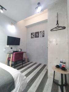 二街館-光影民宿Light Shadow - Xinbei 2nd Street客房内的一张或多张床位