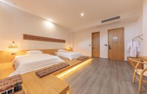 Avatar Mountain Resort客房内的一张或多张床位