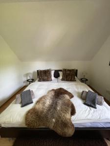 Postel nebo postele na pokoji v ubytování Ferienhaus am Wald