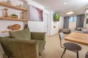 Posezení v ubytování Moses Luxury apartments הבית בכ"ה