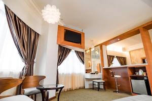 Kuchyň nebo kuchyňský kout v ubytování MITC Hotel