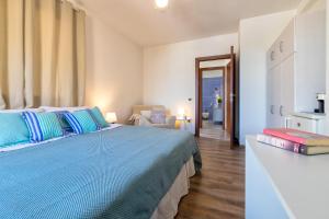 Posteľ alebo postele v izbe v ubytovaní Sardinia Guest House