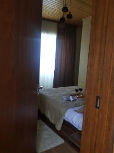 Letto o letti in una camera di Cozy House Kazbegi