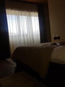 Letto o letti in una camera di Cozy House Kazbegi