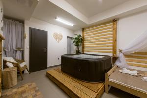 Posteľ alebo postele v izbe v ubytovaní Private Relax Armonia Wellness Apartment