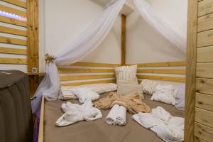 Posteľ alebo postele v izbe v ubytovaní Private Relax Armonia Wellness Apartment