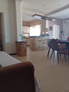 A kitchen or kitchenette at Villa Red Porto Cheli
