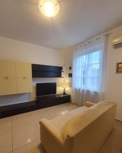 Posezení v ubytování La casa di Elena Versilia - Two Apartments