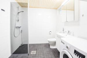 Koupelna v ubytování Tuomenkartano Apartments by Hiekka Booking