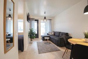 Posezení v ubytování Tuomenkartano Apartments by Hiekka Booking