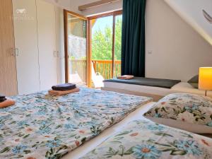 Postel nebo postele na pokoji v ubytování Apartment DREN near terme Topolšica