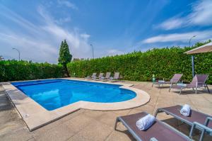 Der Swimmingpool an oder in der Nähe von Ideal Property Mallorca - Villa Anna