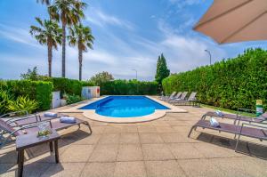 Der Swimmingpool an oder in der Nähe von Ideal Property Mallorca - Villa Anna