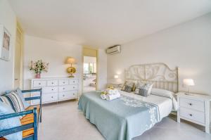 Ein Bett oder Betten in einem Zimmer der Unterkunft Ideal Property Mallorca - Villa Anna
