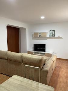Televízia a/alebo spoločenská miestnosť v ubytovaní Jaen Essence- Vivienda con Fines Turísticos La Victoria
