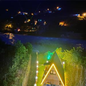 an aerial view of a house at night at SezBungalov in Ardeşen