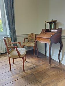 Posezení v ubytování Le Château des Portes