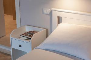 Postel nebo postele na pokoji v ubytování Podere n.8 Bio Casale Maremma