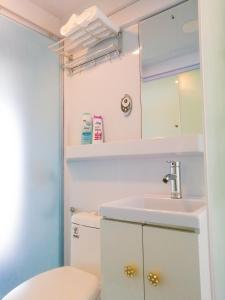 a bathroom with a toilet and a sink at The Dome @ Gua Musang in Gua Musang +16 photos