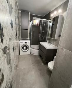 A bathroom at Apartament Zbyszek