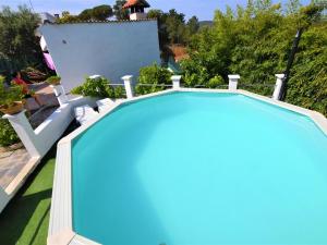 Bazén v ubytování Apartament Gina a 3 kms d Lloret de mar nebo v jeho okolí