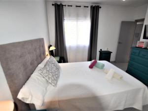 Postel nebo postele na pokoji v ubytování Apartament Gina a 3 kms d Lloret de mar